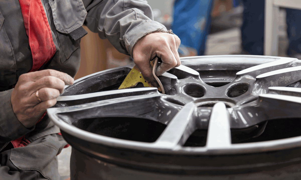 An alloy wheel being polished up.