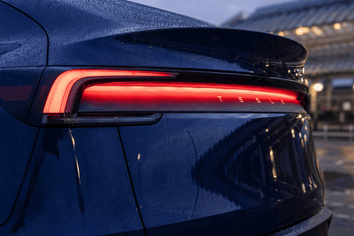 Tesla rear shot with lights on