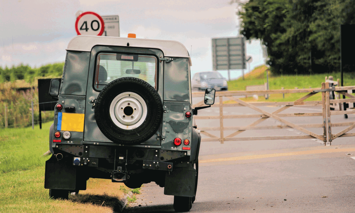 Land Rover Defender at side of the road