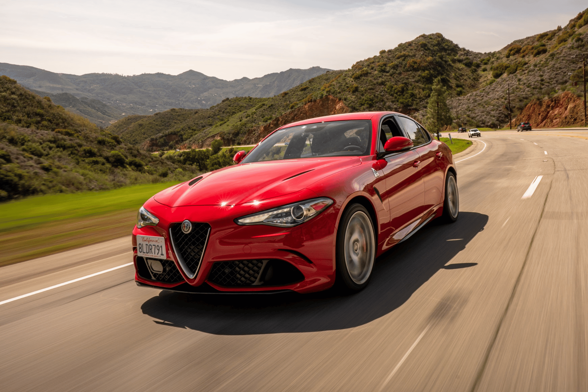 Alfa Romeo exterior shot of driving on road
