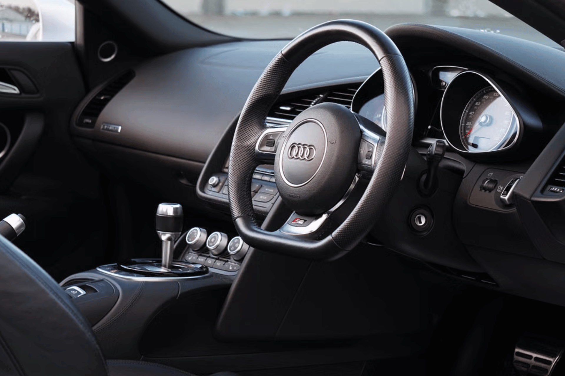 Black Audio Interior, showing steering wheel.