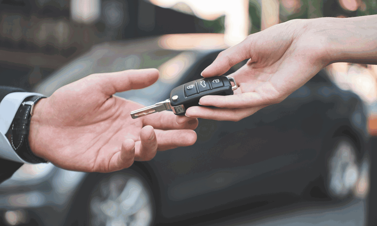 Car keys being handed over
